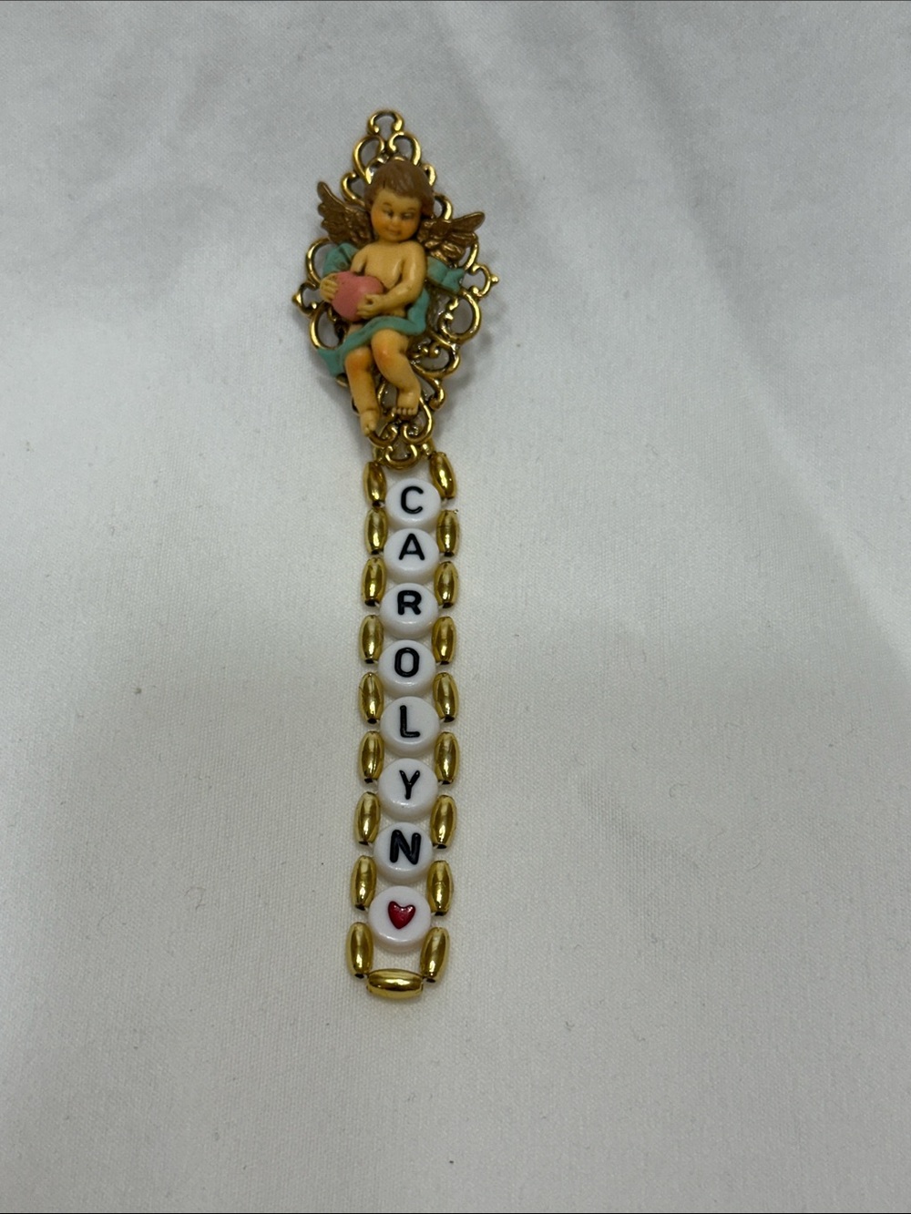 Stanley Gold-Tone Angel Brooch with Pink and Blue Accents